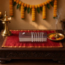 Lalita Sahasranama Stotram & Namavali – Malayalam Palm Leaf Style Book – shown in a home pooja room