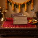 Prayers for Daily Chanting – English Palm Leaf Style Devotional Book – shown in a home pooja room