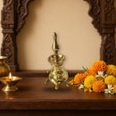 Vastu Vilakku Brass Oil Lamp – Traditional Pooja Deepam, 8 Inch – shown in a home pooja room
